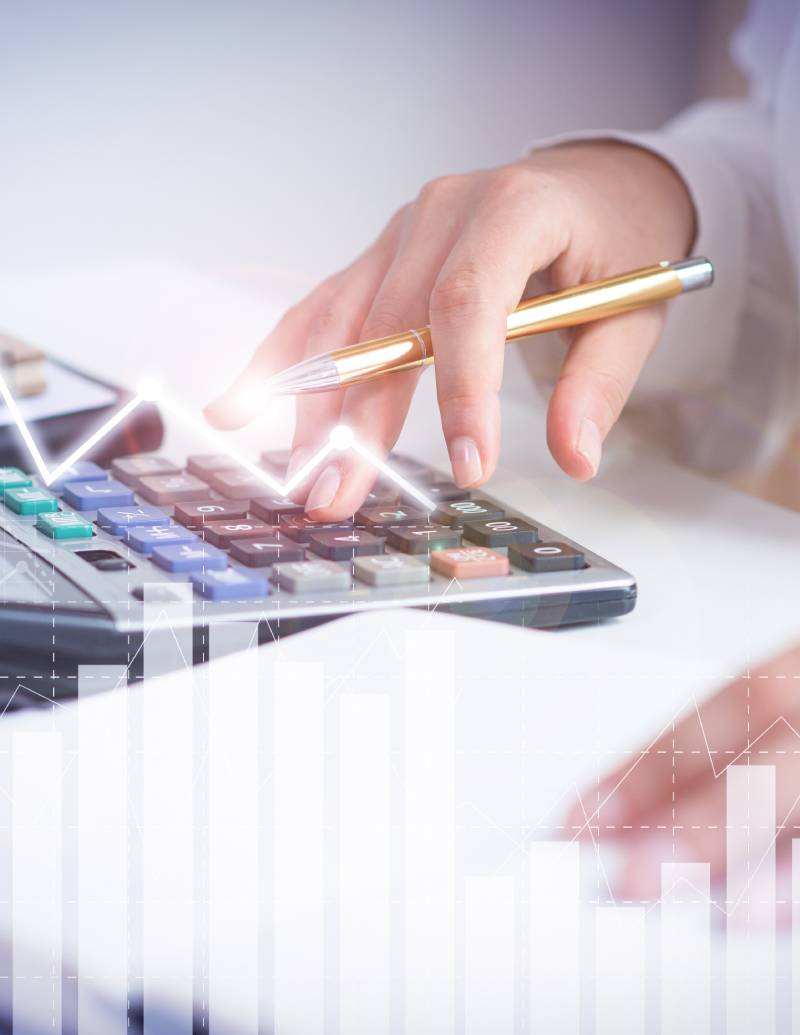 accountant calculating profit with financial analysis graphs